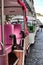 Colorful Tuk-Tuks parked in a Lisbon street