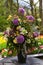 Colorful tulips, roses, narcissus, hyacinths, lily, hydrangeas, muscari flowers in vase