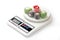Colorful turkish delight on digital kitchen scale