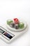 Colorful turkish delight on digital kitchen scale