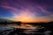 Colorful twilight cloudy sky at the sunset background reflect on water in flooding rice field land texture with mountain and tree