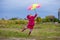 Colorful umbrella cute girl jump funny to sky