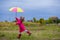 Colorful umbrella cute girl jump funny to sky