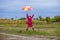 Colorful umbrella cute girl jump funny to sky