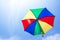 Colorful umbrella floating with beautiful blue sky
