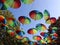 Colorful umbrellas hanging in the breeze