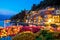Colorful Varenna lakefront architecture evening view, Como lake