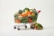 colorful variety of fresh fruits and vegetables in a fully stocked supermarket shopping cart