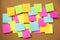 Colorful variety post it. paper note reminder sticky notes pad on cork