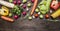 Colorful various of organic farm vegetables Ingredients for cooking vegetarian food on wooden rustic background top view border ,w
