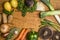 Colorful various of organic farm vegetables on wooden rustic background top view close up place text,frame