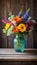 A colorful vase filled to the brim with fresh flowers perched atop a rustic wooden table displays a burst of blooms.