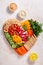 Colorful vegan Charcuterie board with raw vegetables and whole wheat snacks