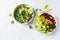 Colorful vegetable bowl with bulgur and chickpeas and kale-bulgur tabbouleh with garlic lime dressing