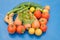 Colorful vegetables on blue background. High fibrous food with immunity boosting