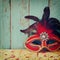 Colorful Venetian masquerade mask. selective focus. vintage filtered