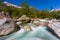 Colorful Verzasca valley with green river water in spring, blue sky