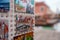 Colorful and Vibrant Display of Venice, Italy Postcards on Wall - Travel and Culture Concept