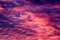 Colorful vibrant dramatic cloudscape at sunset with clouds in evening