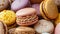 Colorful vibrant macarons background with assorted collection of sweet french pastries