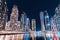 colorful view of the famous tourist attraction of the city of Dubai - Marina seaport and illuminated skyscrapers. Travel and