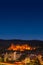 Colorful view of old downtown in Heidelberg, old bridge, statues and ancient castle during sunset, Heidelberg, Germany