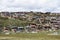 Colorful village on the hill,  in the grasslands of Tagong