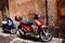 Colorful vintage scooters parked at Pisa city center