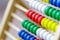 Colorful vintage style wooden abacus. For Learning Basic Mathematics Calculator - Close up