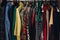 Colorful wardrobe with variety of clothes.