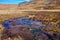 Colorful water source, on the way to Pastoruri Glacier, at Huascaran National Park