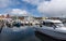 Colorful waterfront Nordic buildings and boats in Torshavn Harbour, Faroe Islands