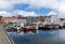 Colorful waterfront Nordic buildings and boats in Torshavn Harbour, Faroe Islands