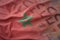 Colorful waving national flag of morocco on a euro money banknotes background.