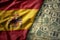 colorful waving national flag of spain on a american dollar money background. finance concept