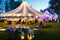 Colorful wedding tents at night. Wedding day