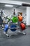 Colorful weights in gym for training with barbell