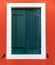 Colorful window of a house on the Venetian island of Burano, Venice. Facade of the houses of Burano close-up. Venice, Italy.