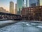 Colorful winter sunset over a frozen Chicago River