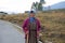 Colorful Woman Pauses From Her Work in Rural Bhutan