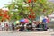 Colorful women street market Flame trees, Africa