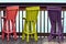 Colorful Wooden Bar Stools at a Waterfront Cafe