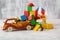 Colorful Wooden Blocks with Toy Cars Arranged with Imagination t