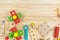 A colorful wooden building kit for children on wood. Set of tools on wooden table. Games and tools for kids in preschool