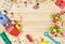 A colorful wooden building kit for children on wood. Set of tools on wooden table. Games and tools for kids in preschool