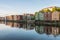 Colorful wooden buildings near Nidelva river in the city of Bakklandet/Trondheim in Norway.