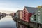 Colorful wooden buildings near Nidelva river in the city of Bakklandet/Trondheim in Norway.