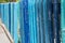 Colorful wooden fence in different shades of blue