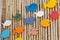 Colorful wooden fishes on the bamboo surface,
