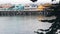 Colorful wooden houses on piles or pillars, Old Fisherman's Wharf, Monterey bay.